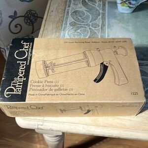 The Pampered Chef Cookie Press 16 Different Cookie Disks.